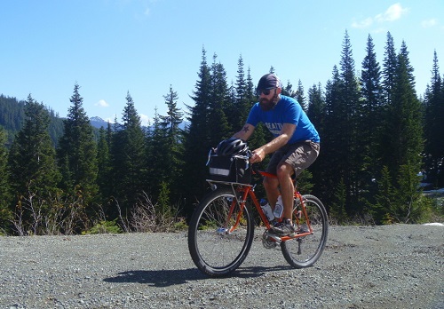 What kind of ride is a national forest ride? They are characterized by long days, fast riding on rough surfaces, lots of climbing, sketchy descents, and doing this while carrying a small load of food, water, supplies, and emergency camping gear. Photo courtesy of Josh Cohen/Elephant Bikes